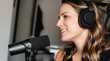 lady speaking into microphone