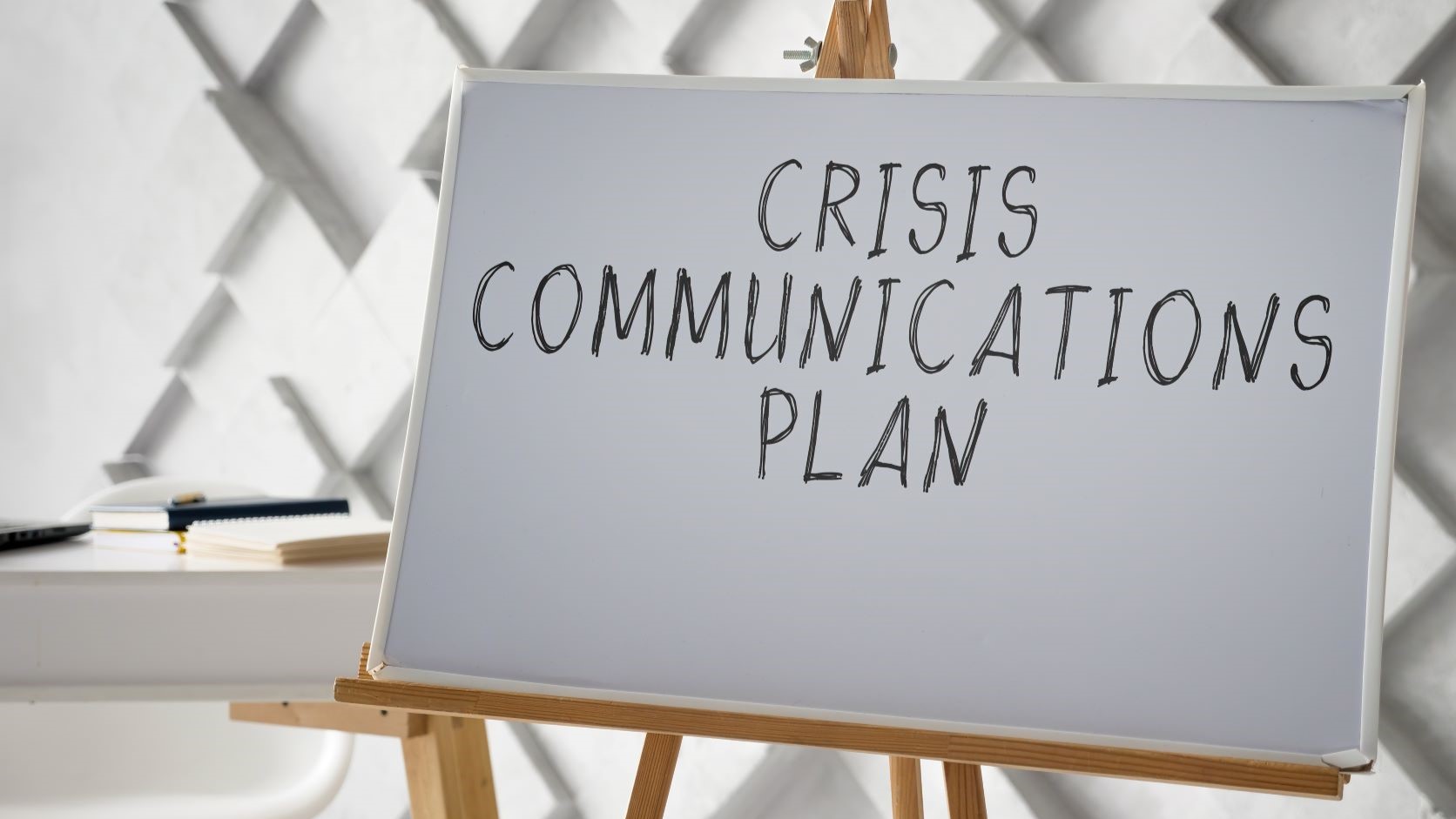 a sign reading crisis communications